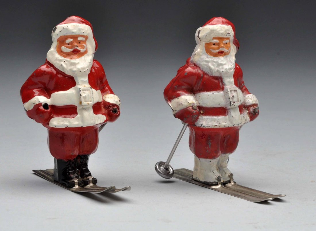 Lot of 2: Pot Metal Santa on Skis. (1 of 2)