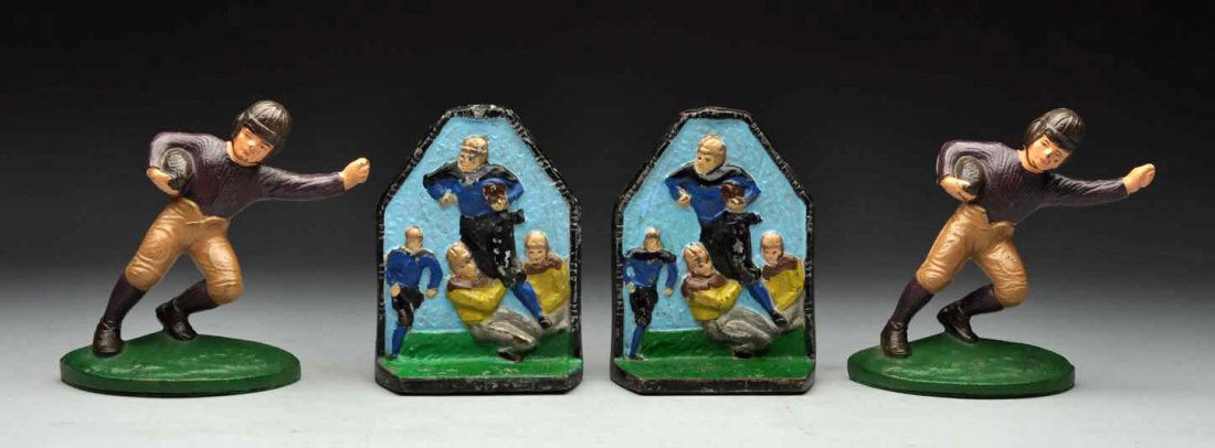 Lot of 2: Cast Iron Football Player Bookends.: Football player rushing with football – made by John Wright; and embossed football player being tackled – Signed “GT, Copyright”. Condition (Very Good - Excellent). Size 5 - 3/4" T.