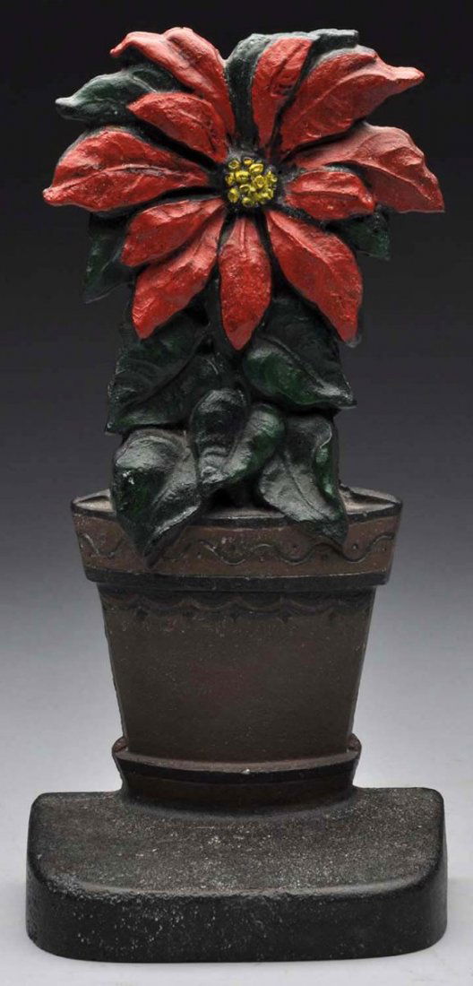 Cast Iron Poinsettia Doorstop. (1 of 3)