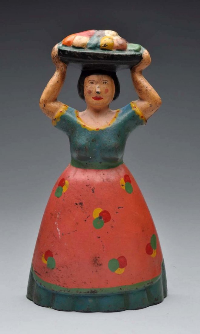 Cast Iron Tropical Woman With Fruit Doorstop. (1 of 2)