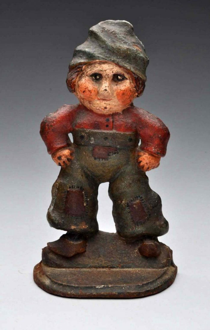 Cast Iron Peasant Boy Doorstop. (1 of 2)