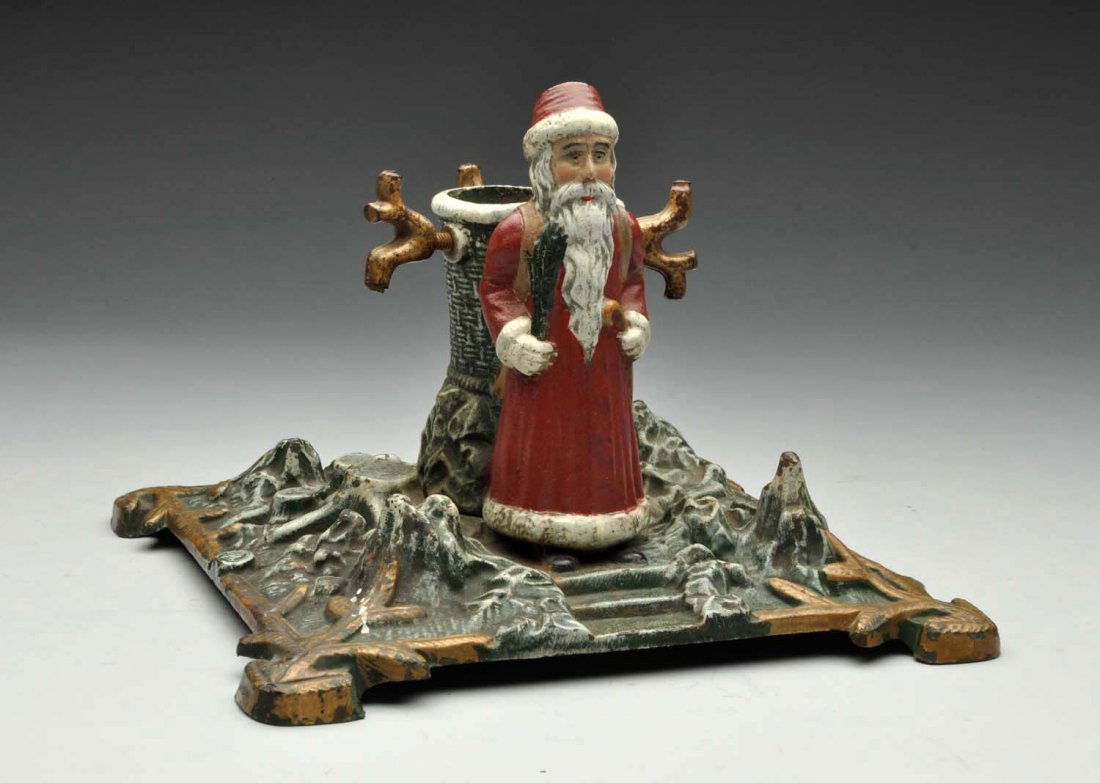 Cast Iron Father Christmas Tree Stand. (1 of 2)
