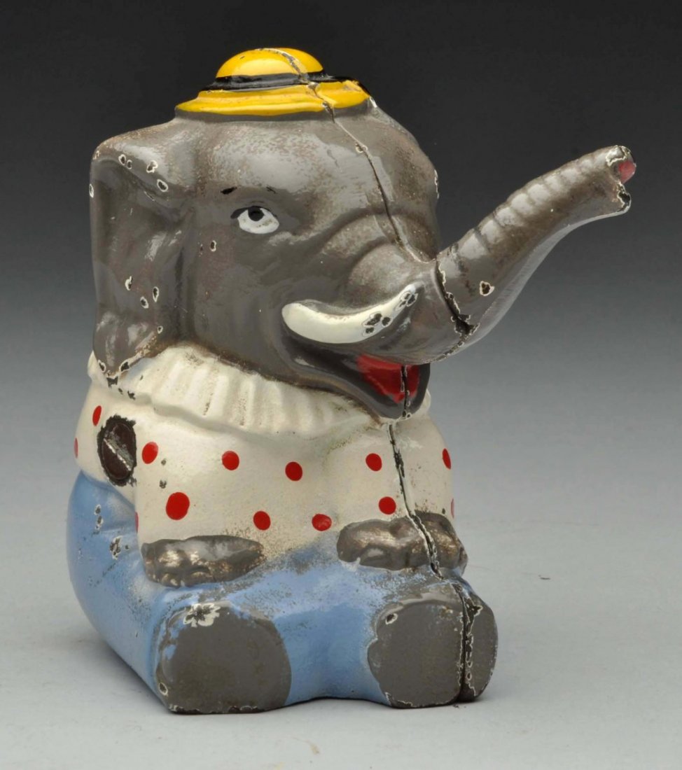 Cast Iron Sitting Circus Elephant Still Bank. (1 of 3)