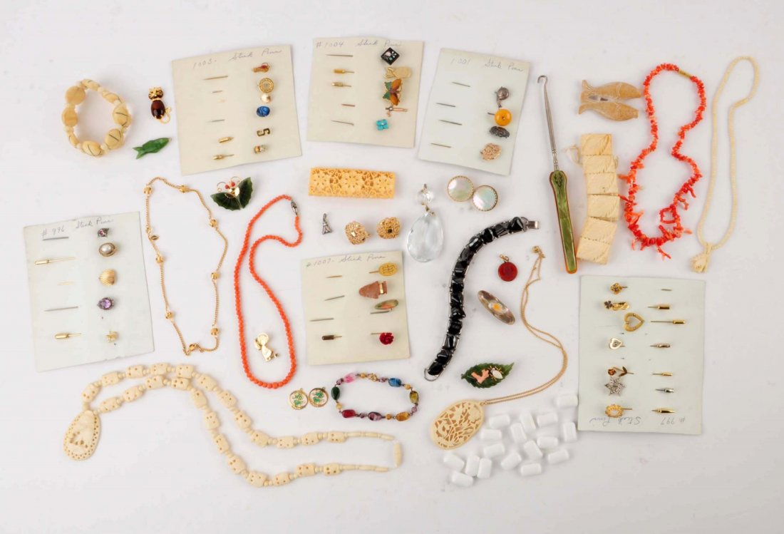 Large Lot Of Assorted Jewelry.: Including coral bead necklaces, carved bone necklaces, pins, bracelets and pendants; jade pins, pendant; various costume earrings, bracelets, collection of stick pins; etc. Condition (Good).