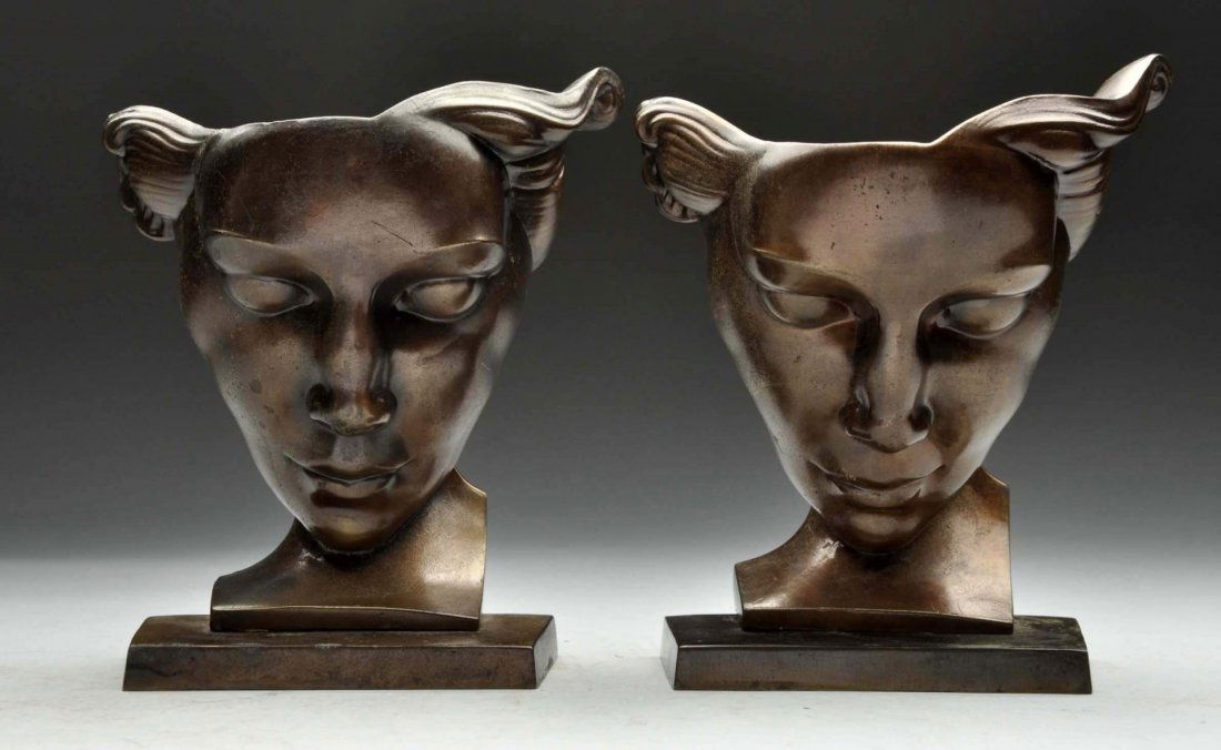 Frankart Brass Woman Bookends.: This pair of Frankart bookends is in great condition. One is loose at the base and will need to be reattached. Condition (Excellent). Size Each: 7 - 1/2" T. x 6 - 1/2" L.