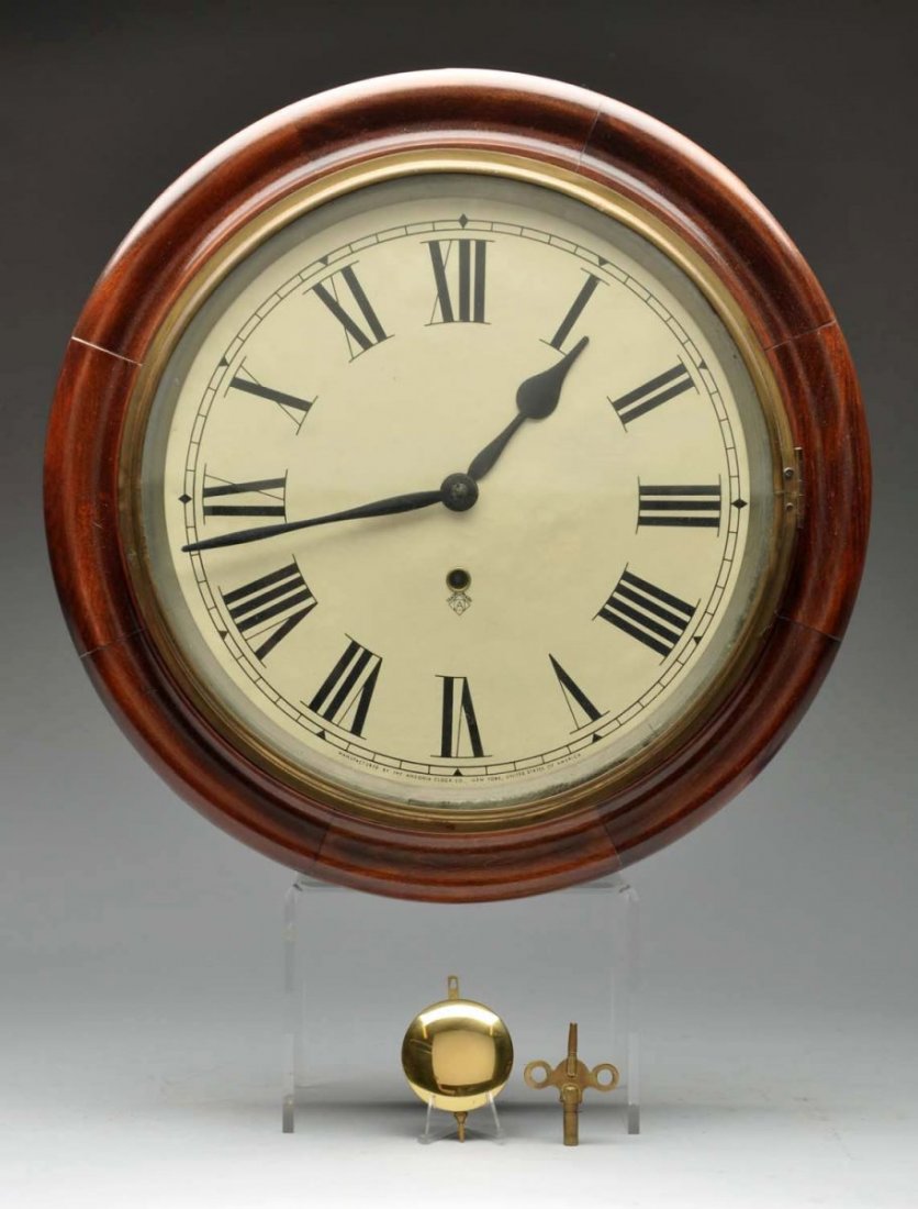 Wall Clock by Ansonia.: Has pendulum and key. Condition (Excellent). Size 16 - 1/4" Dia.