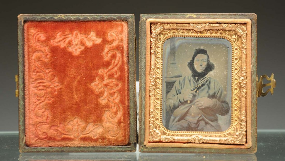 Ambrotype of Man Holding Gun.: 1/9 plate. Clear image. Leather case separated. Condition (Excellent). Size 3" L.
