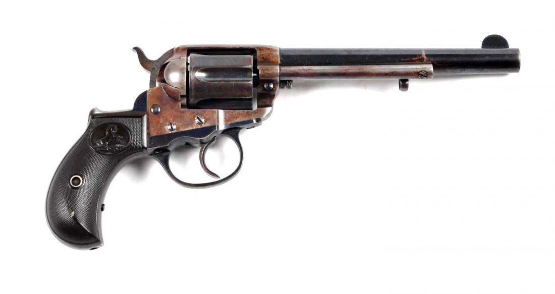 Colt Model 1877 Lightning Double Action Revolver.: Serial # 102355 .38 Long Colt with a 6" barrel. This revolver was manufactured in 1896. It is a scarce 6” standard double action revolver with roll-dye barrel address. The barrel retains approximate