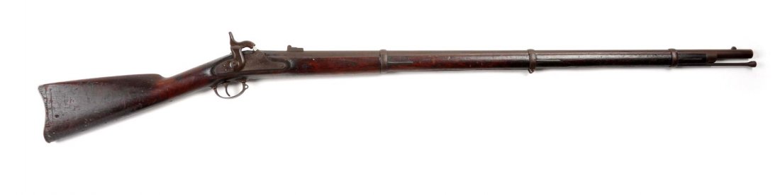 U.S. Springfield Model 1861 Rifle-Musket.: 40" barrel in .58 bore-percussion. This is an early standard issue model 1861 U.S. rifle-musket manufactured at Springfield Armory. Standard features include three U.S. marked barrel bands, folding le