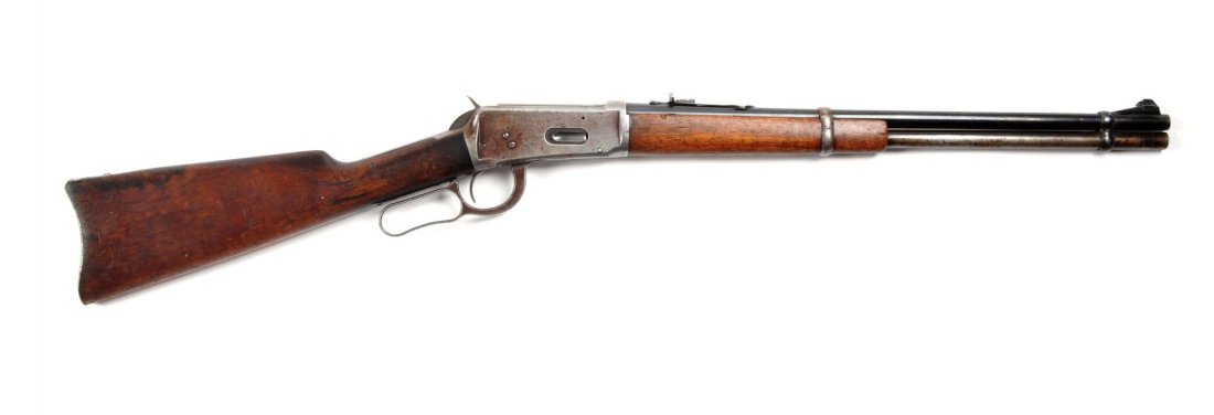 Winchester Model 1894 Saddle Ring Carbine.: Serial # 126212 .30-30 caliber with a 20" barrel. The frame was manufactured in 1898. It was re-barreled at a later date and features a later barrel marking with the ramp front sight. It is a standard
