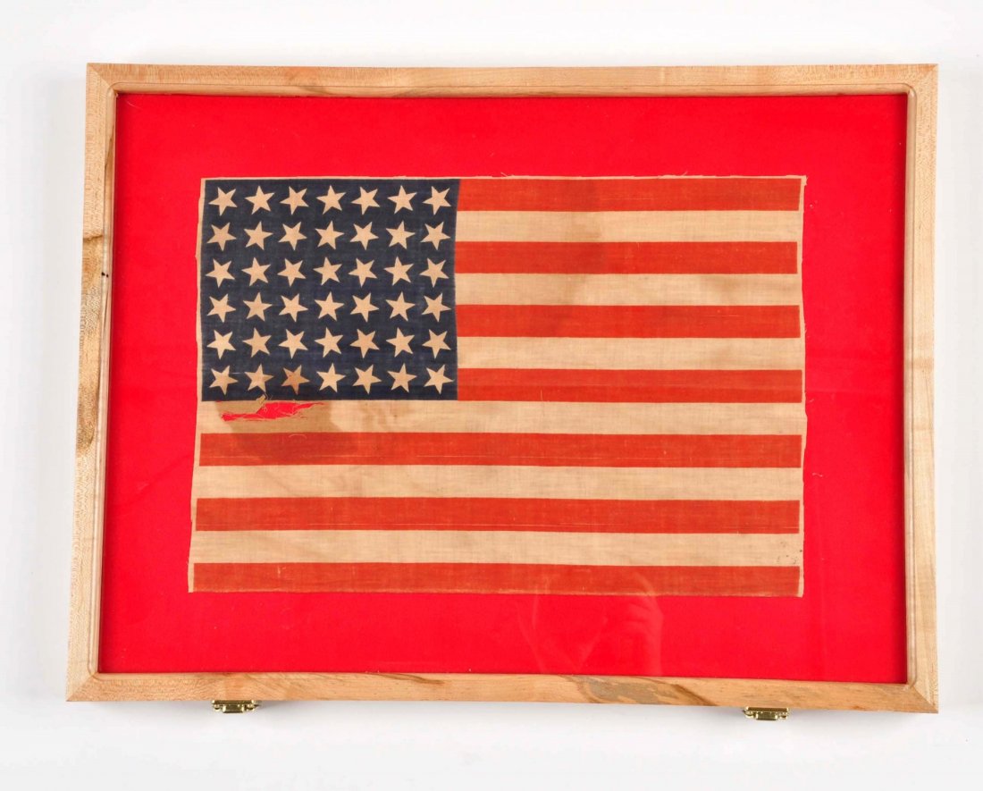 Early Linen American Flag.: This early linen flag measures 17" long and 12" tall. It has seven red stripes, six white stripes and 42 stars. American flew an 38 star flag in 1877 and 43 start flag in 1890. Washington was the 42nd