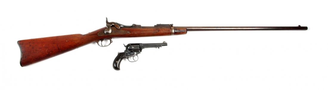 Lot Of 2: Antique Firearms.: Serial # 438529 & 8721 This lot consists of two antique firearms to include: a Colt Lightning Model 1877 double action revolver with a 5" barrel in .41 long Colt caliber. Manufactured in 1878. Revolve
