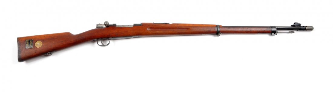 **Model 1896 Swedish Mauser Bolt Action Rifle.: Serial # 332662 6.5x55mm caliber with a 29" barrel. This example is dated 1915 manufactured by Karl Gustafs Stads. Has the crest on bridge. Bolt and frame have matching numbers. Gun remains in excelle