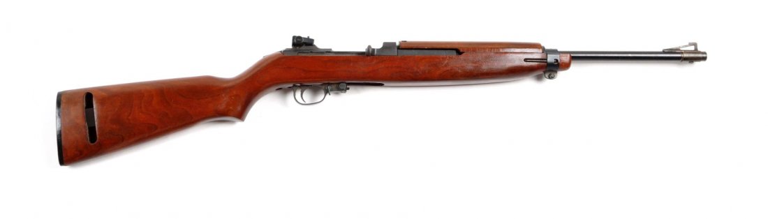 **Plainfield .22 Cal. M1 Carbine.: Serial # A205 .22 rimfire with an 18" barrel. Manufactured in Plainfield, New Jersey. It is a .22 semi-automatic based on the World War II M1 Carbine. Magazine fed, walnut stock, blued finish, semi-au