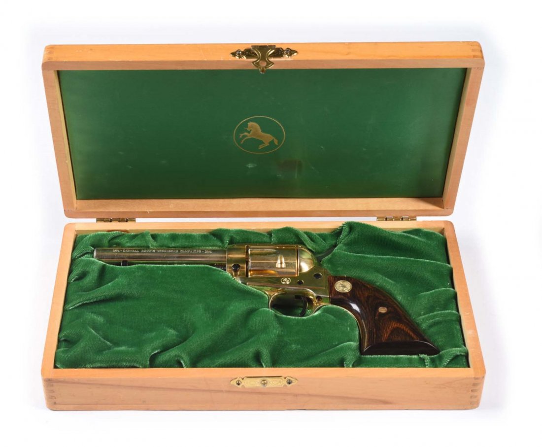 **1964 Colt Gen. Hood Tennessee Comm. Revolver.: Serial # 0373GH This is a Colt Scout Gen. Hood's Tennessee Campaign commemorative single action .22 revolver. Gun is new in original Colt display case. 4-1/2” barrel and is entirely gold plated with