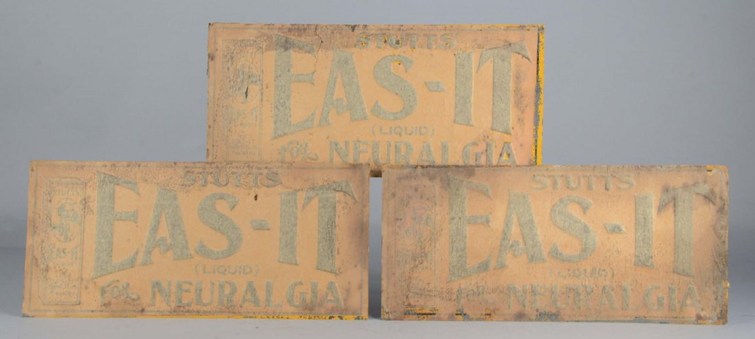 Lot Of 3: Stutts Eas-it Medical Advertising Signs: Each embossed tin sign is from The Eas-it Chemical Co. of Florence and for neuralgia relief. NOS - Still has the protective paper on it- but has some paint loss and aging due to storage. Circa 1920s. 