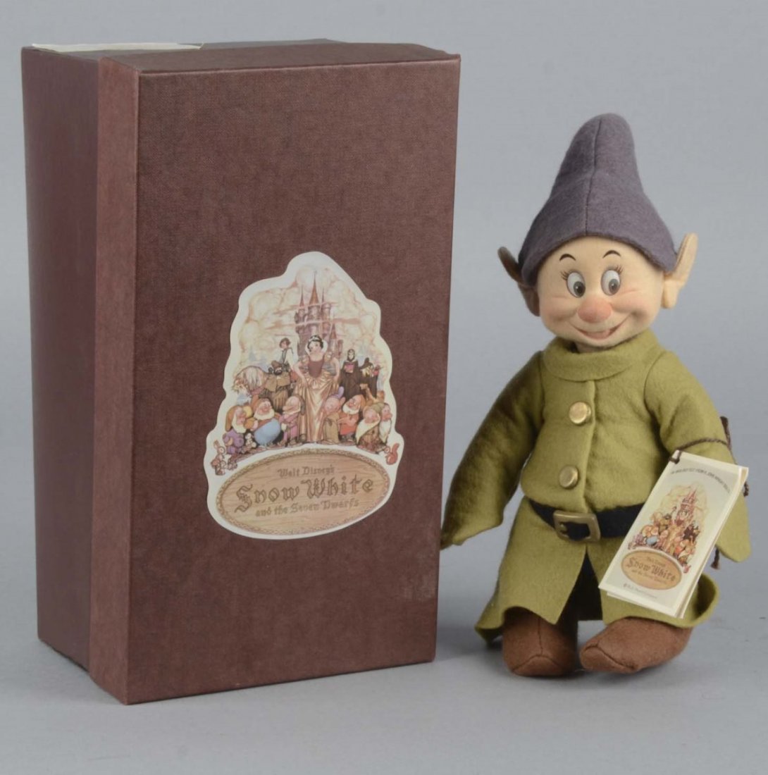 R. John Wright Snow White Dopey Doll: Collectible doll of Dopey the Dwarf from Walt Disney's Snow White And The Seven Dwarves in original box. No. 1679 of 2500. Condition (Near Mint Plus). Size 11-1/4" x 4-1/4" x 6-1/4"
