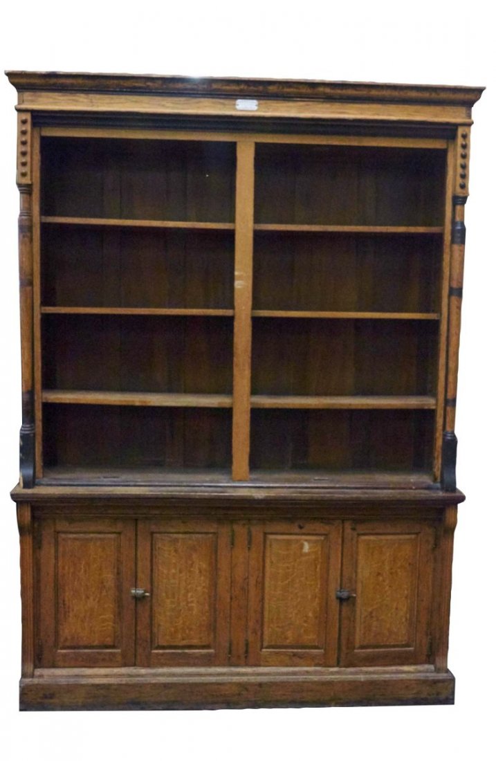 Brunswick Balke Collender Co. Wood Display: Cabinet features 4 lower opening doors and antiqued pillars. Top plaque reads "Billiards & Pool Tables - Bank Office & Saloon Fixtures". Condition (Good). Size Approximately 72" x 20" x 100"