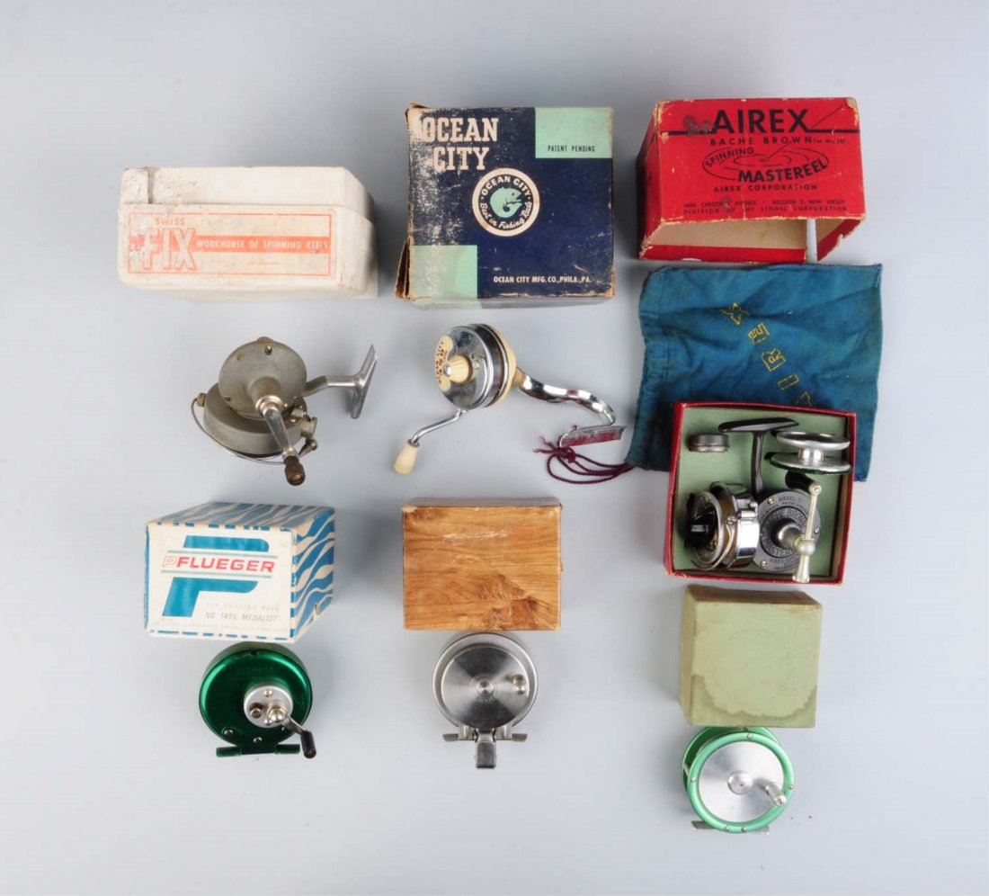 Lot Of 6:Boxed Fishing Reels . (1 of 1)