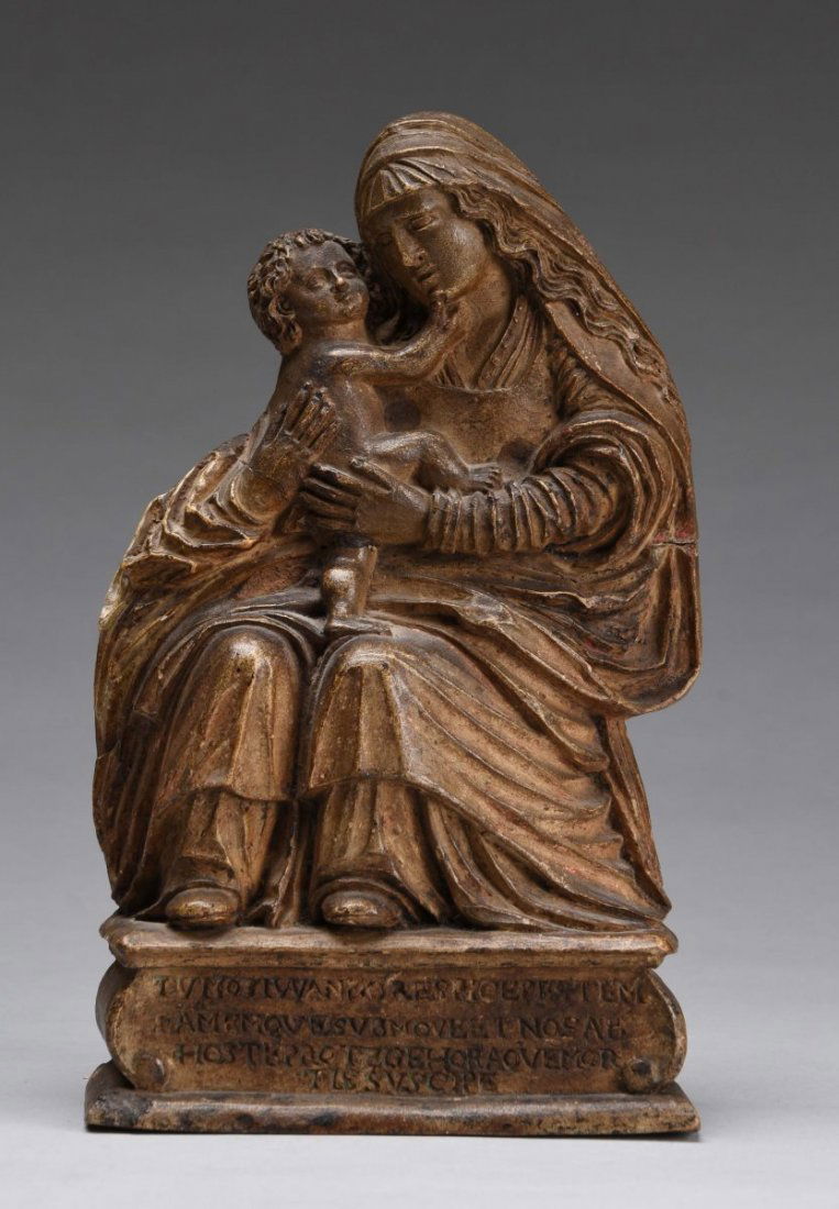 Mother Mary with Christ Statue.: Has a wooden back with a ceramic front design. Chip on front left corner of base. Condition (Very Good). Size 10'' T.