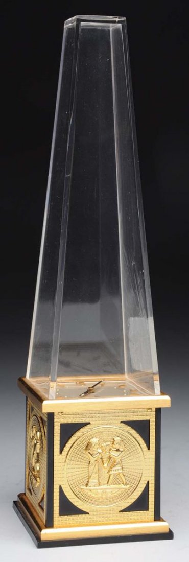 Swiss Made Le Coulter Obelisk Clock.: Unique design with Egyptian characters on all four sides. Great shape with no notable wear. Condition (Near Mint). Size 9 - 1/2" T.