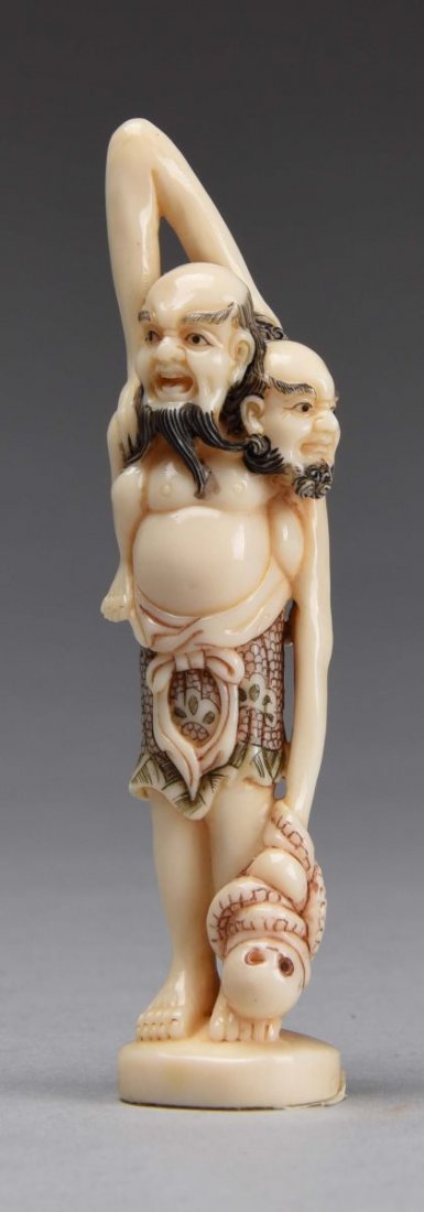Early Japanese Ivory Okimono of 2 men. (1 of 2)