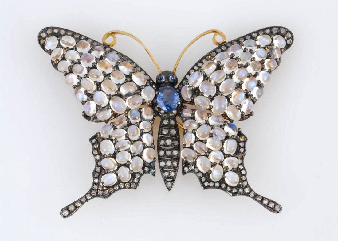 Gold & Sterling Moonstone Butterfly Brooch.: Butterfly contains 18.4 cts of moonstones, 1.00 cts sapphires and .87 cts, of rose cut diamonds.