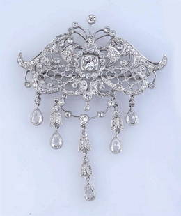 Diamond Platinum Sophia D. Brooch.: RBC, OEC and pear shaped diamonds approximately 5 cts TW. I-K, SI. 12 dwts.