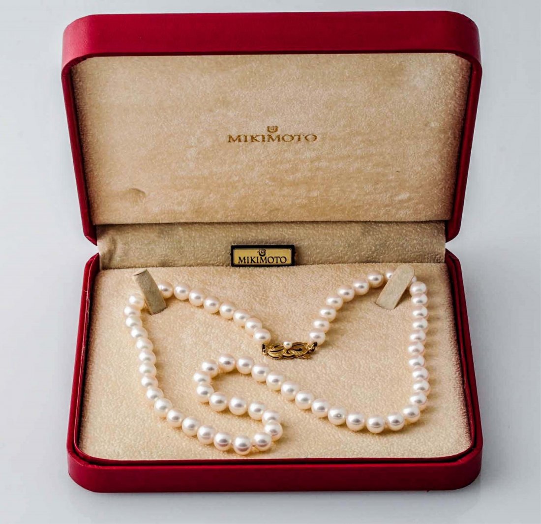 Mikimoto 7-7.6 Millimeter Cultured Akoya Pearls.: 18 K clasp, signed, box.