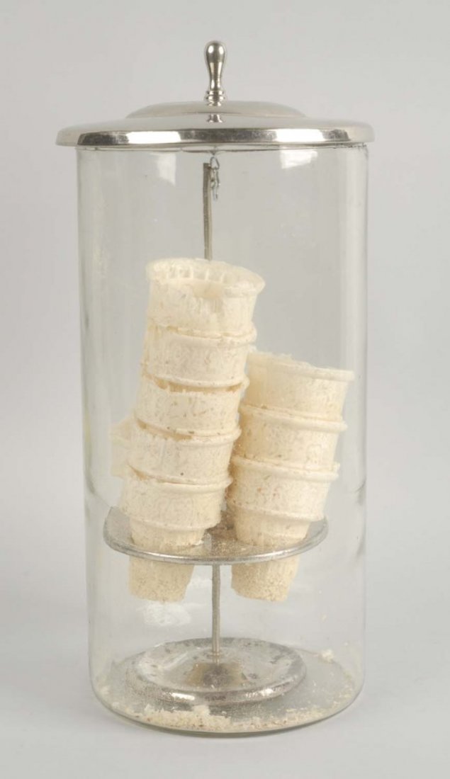 Ice Cream Cone Dispenser.: This counter top ice cream cone holder/dispenser is in great condition. Condition (Excellent). Size 14-1/4'' T.
