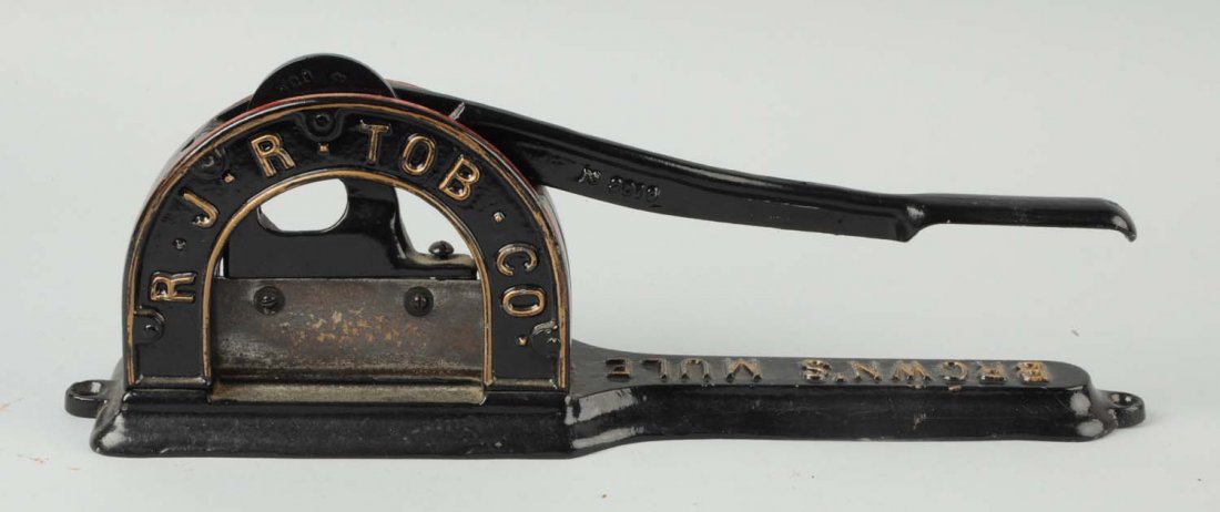 R.J.R. Tobacco Co. Brown's Mule Tobacco Cutter.: Cast iron. Nice condition with very good paint. Condition (Excellent). Size 19" L.