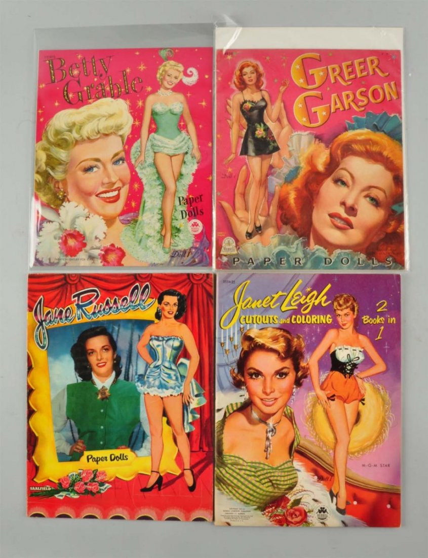 Lot Of 4: Movie Star Paper Doll Sets.: All uncut. Lot includes Betty Grable, Greer Carson, Jane Russell and Janet Leigh. Very minimal wear. Condition (Excellent). Size Largest: 14'' x 10-1/2''.