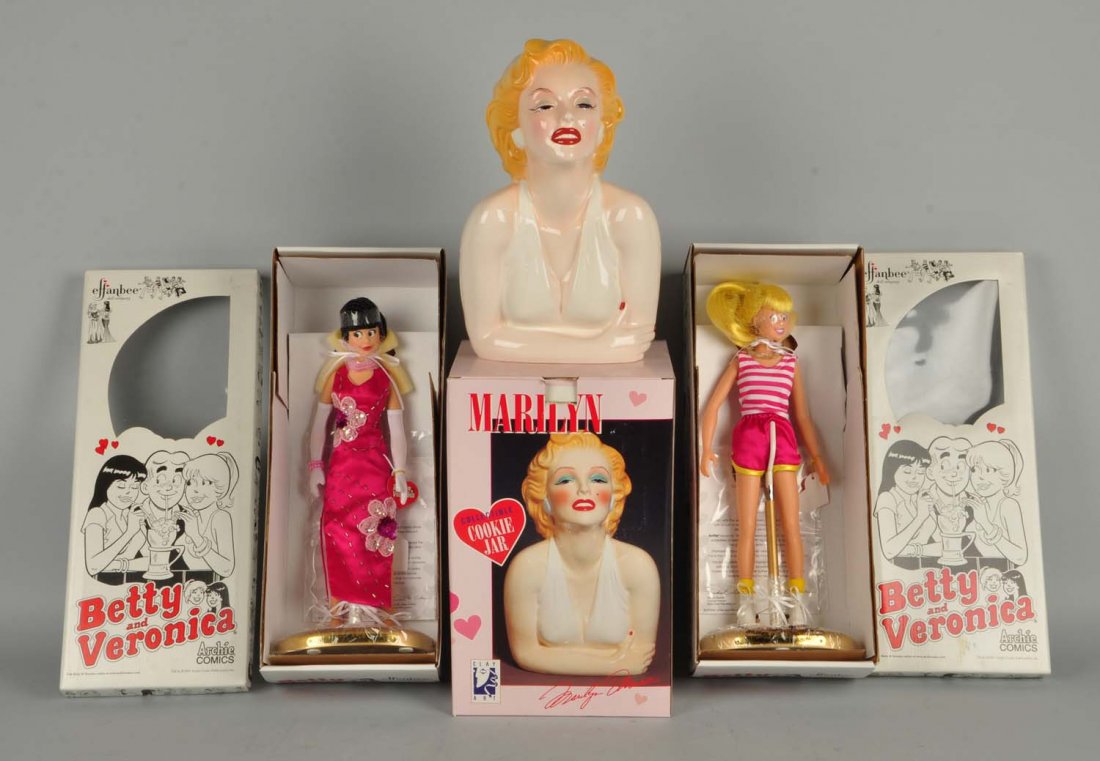 Lot Of 3: Character Items.: Includes two Effanbee Archie Comic dolls (Betty and Veronica), all vinyl circa 2001, and a a ceramic mint in box Marilyn Monroe cookie jar circa 1996. Condition (Excellent). Size Largest: 16" T.