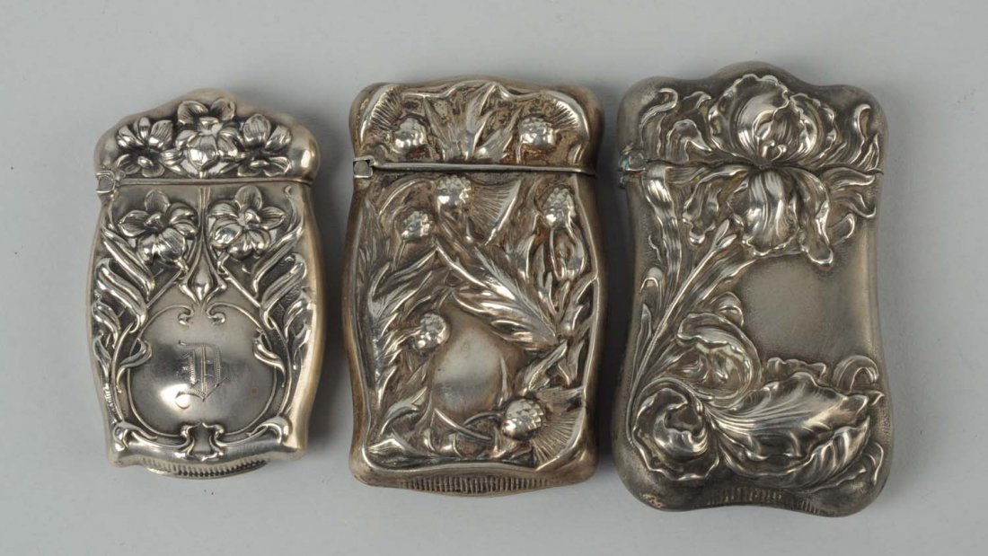 Lot Of 3: Sterling Sliver Match Safes.: All by SF Gilbert. All with floral design, one initialed. Strong hinges. Condition (Excellent). Size Largest : 2 -1/2" L.
