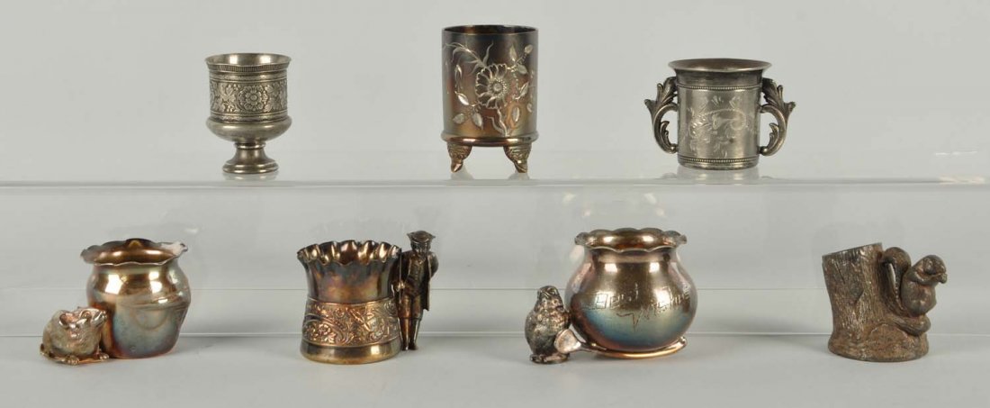 Lot Of 7:Toothpick Holders.: This lot consists of small chick stands by toothpick holder that rests on a wishbone and is engraved "Best Wishes." Marked Derby Silver Co. #2309. Very similar to page 147 - top. Some tarnish/silver l
