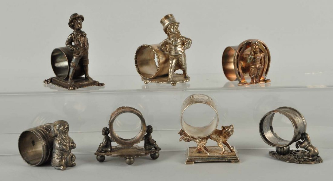 Lot Of 7: Figural Napkin Rings. (1 of 1)