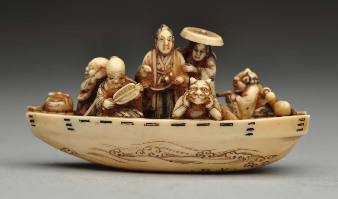 Carved Netsuke Boat with Figures. (1 of 7)