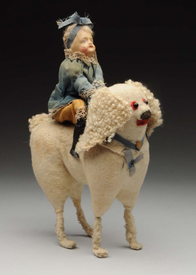 Seated Doll on Wool-Covered Dog. (1 of 3)