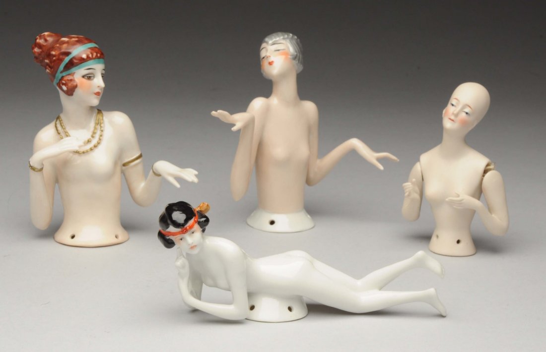 Lot of 4: Half Dolls.: Porcelain flapper with silver hair and very delicate extended arms; all-bisque lady with jointed shoulders and bald head; nude lady lying prone; flapper lady with molded jewelry, brown hair (some wear