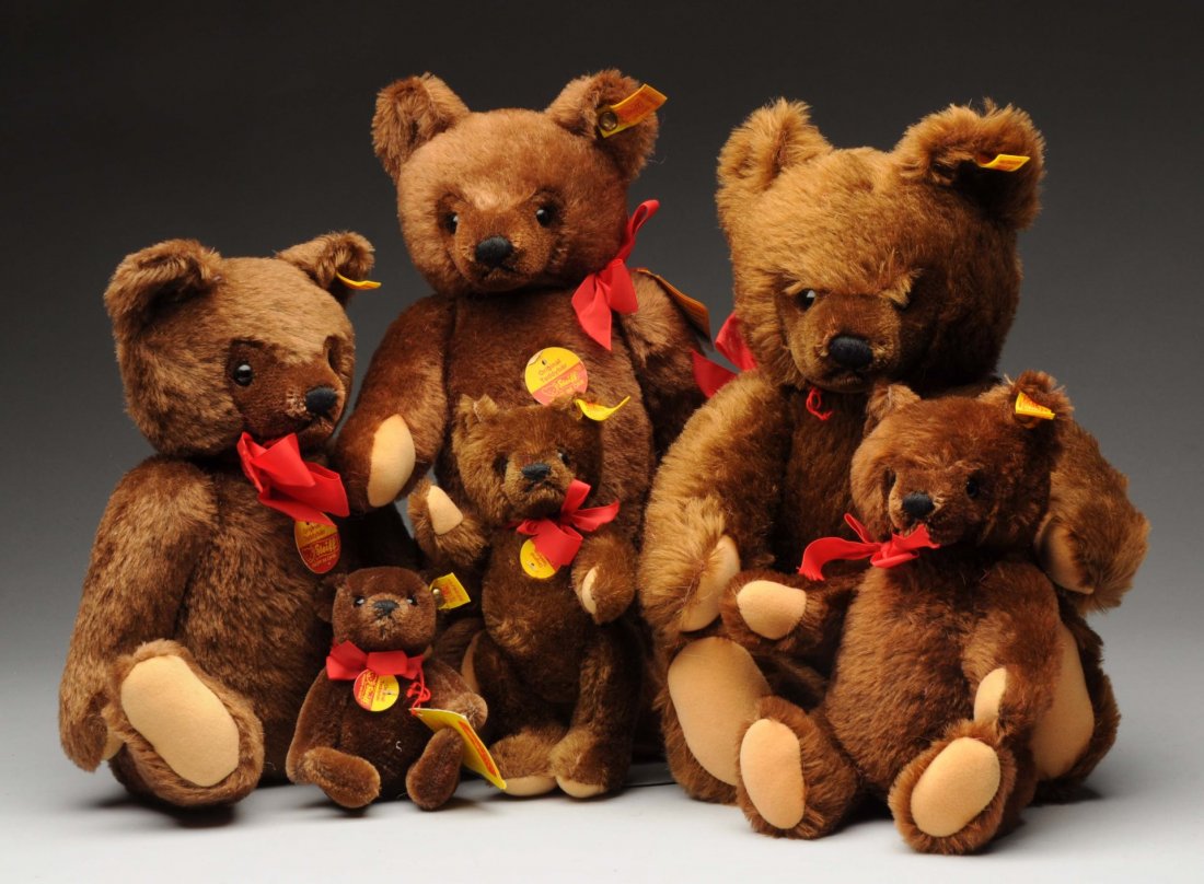 Lot of 6: Chocolate Brown Orig. Bears with IDs.: This Steiff pattern is known as the "mask" Teddy design, named so for its well-defined, masked shaped facial area. This group consists of one 14, 18, 26, 41, and two 36cm bears. All are five-ways join