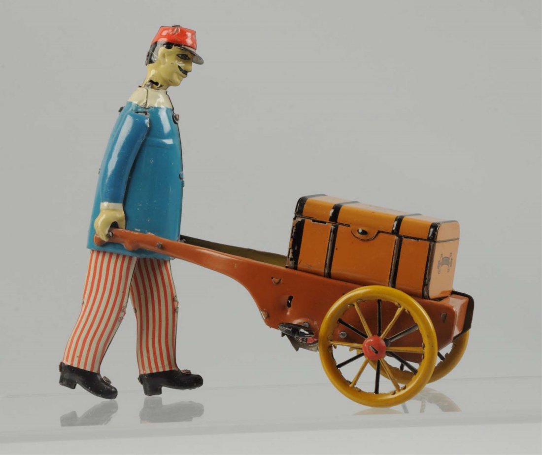 German Tin Litho Wind Up Stock Porter Toy. (1 of 2)