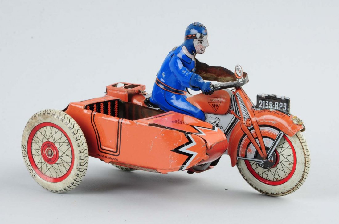 French Tin Litho Wind Up Motorcyclist Toy. (1 of 3)