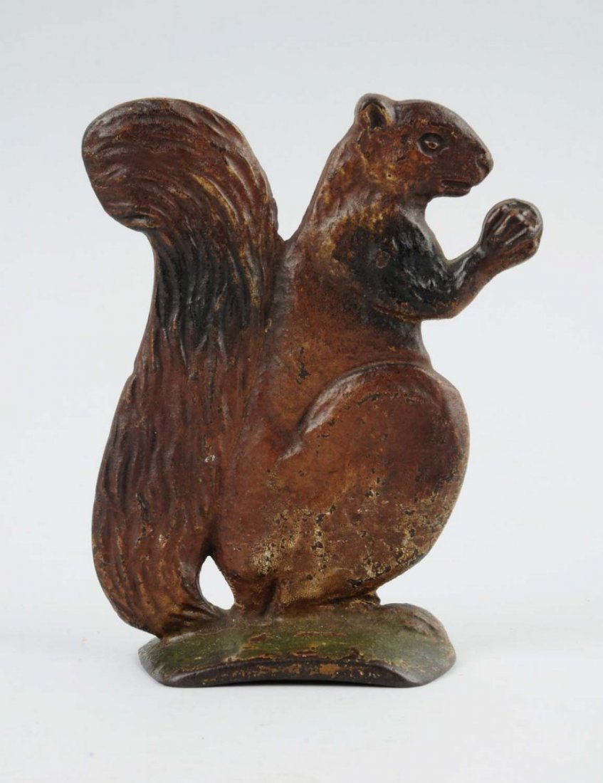 Cast Iron Squirrel with Nut Doorstop. (1 of 3)
