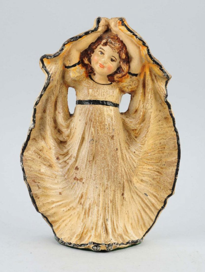 Cast Iron Girl Holding Dress Dancing Doorstop. (1 of 3)