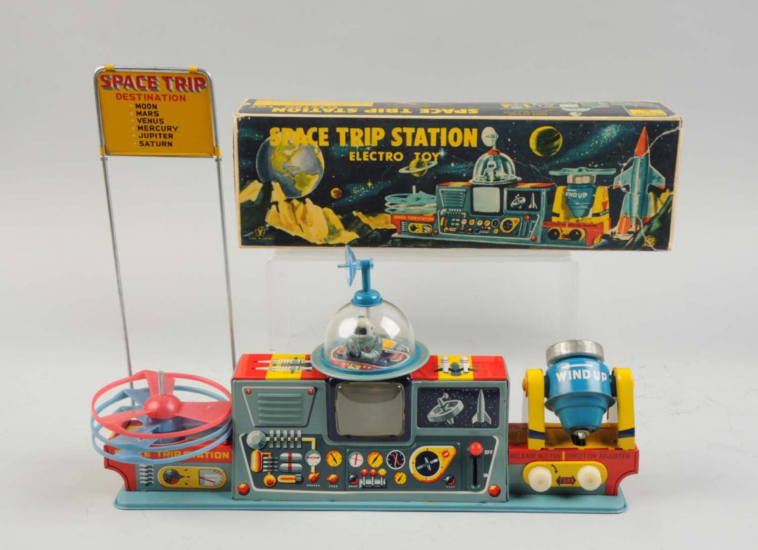 Japanese Tin Litho Battery-Op Space Trip Station. (1 of 2)
