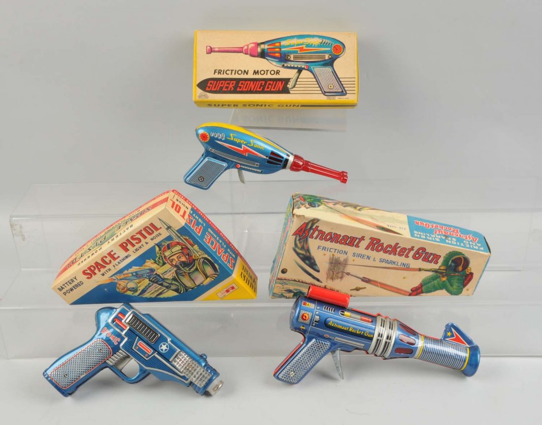 Lot Of 3: Japanese Space Guns In Boxes.: All original boxes with nice color graphics. Two guns are friction. The Daiya "Astronaut Rocket" gun and a Marubishi "Super Sonic" gun. The third is a battery operated, Rosko "Space Pistol". Boxes hav