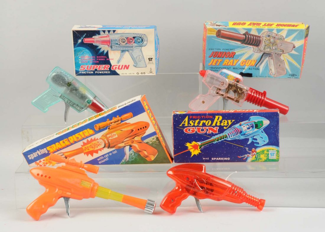 Lot Of 4: Foreign Made Space Guns In Boxes.: All in original boxes with nice color graphics. Three are Japanese and one is made in Hong Kong. The one from Hong Kong is a Sparkling Space Pistol. The three Japanese ones are an Astro-Ray gun, a Jun
