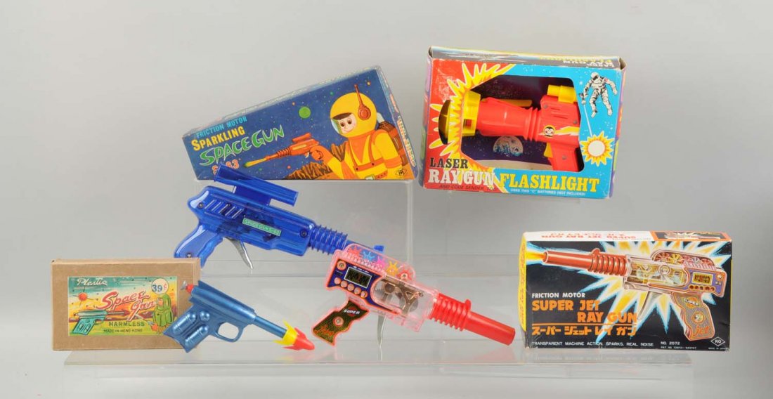 Lot Of 4: Foreign & American Space Guns In Boxes.: All in original boxes with nice color graphics. Some creasing to boxes. Sparkling Space gun "S-63" made in Japan. A Super Jet Ray gun made in Japan. A plastic Space gun made in Hong Kong and a Laser R
