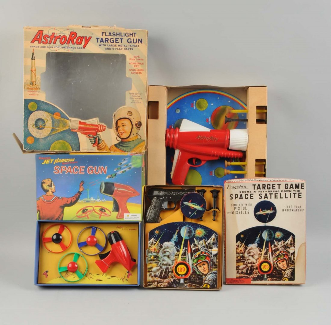 Lot Of 3: Space Gun and Target Sets In Boxes: All in original boxes with nice graphics. Contemporary Chinese "Jet Harrison" space gun, "Astro Ray" gun and target set made by Ohio Art and the last is a Cragston Japanese Space Satellite target game