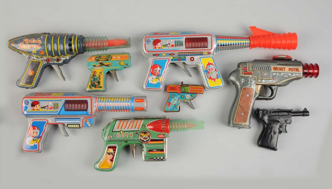 Lot Of 8: Foreign Made Space and Character Guns. (1 of 1)
